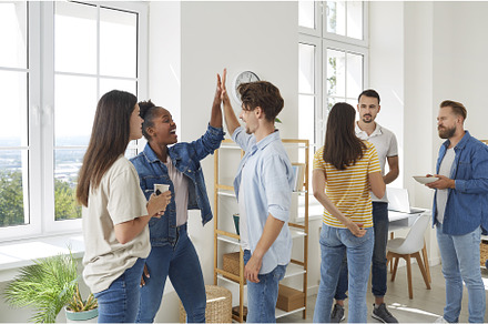 A group of young business people in, a Business Photo by StudioRomantic