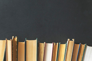 Old books on a black background