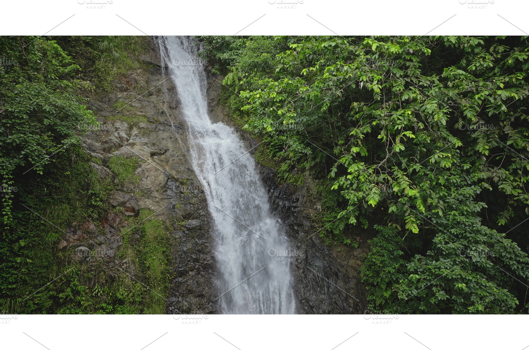 Cascading waterfall flowing through, a Nature Photo by Goinyk