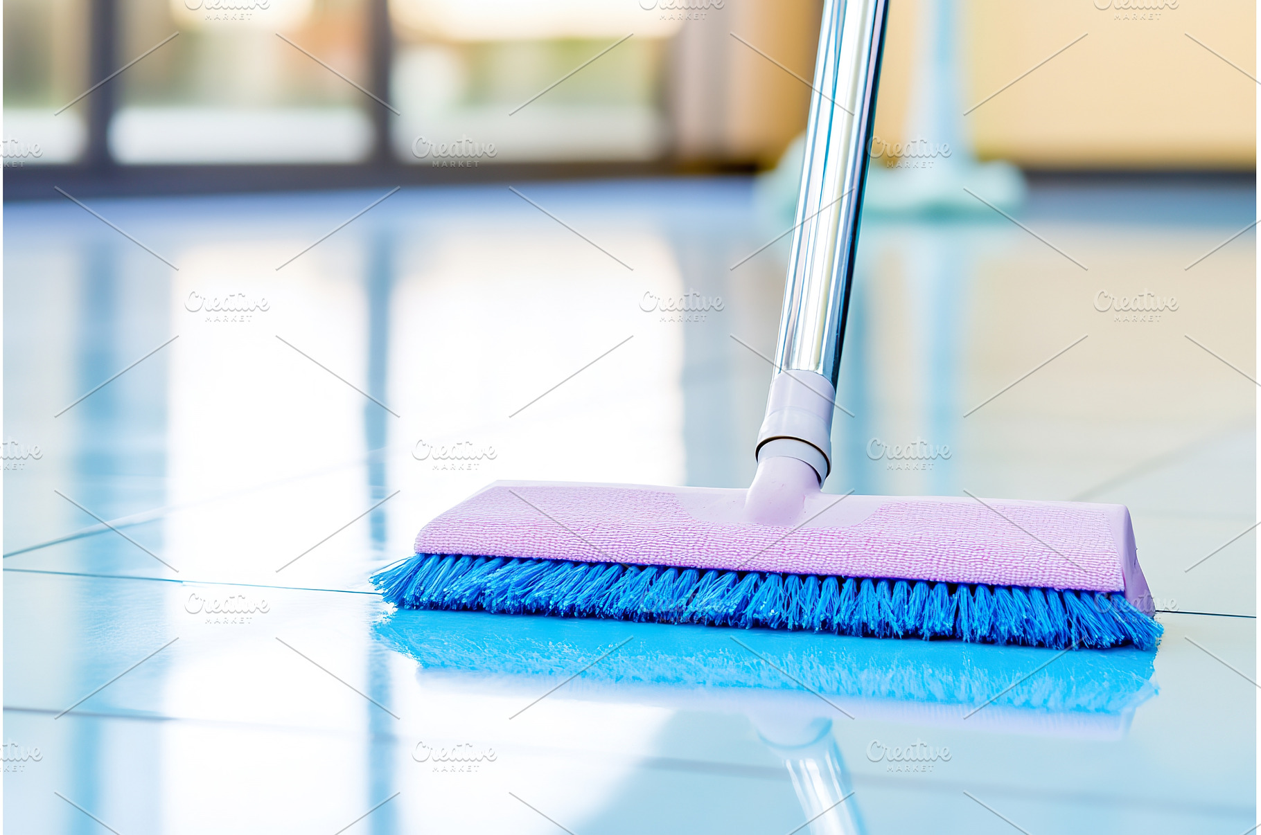 Close up of mop cleaning shiny tile, an Architecture Photo by Lermont51