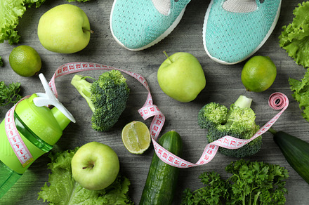 Healthy lifestyle accessories on gray textured background, a Food & Drink Photo by AtlasStudio PRO