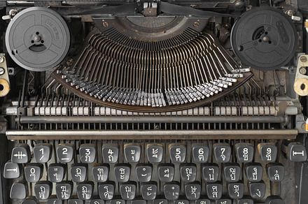 Old Thai traditional typewriter. Classic vintage antique manual, a Photo by Tampatra
