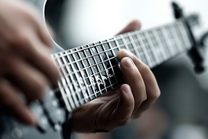 Close up of a musician’s hand play, an Arts & Entertainment Photo by MistyDay