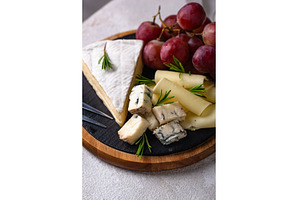 Different types of cheese, wine and, a Food & Drink Photo by Yulia Furman