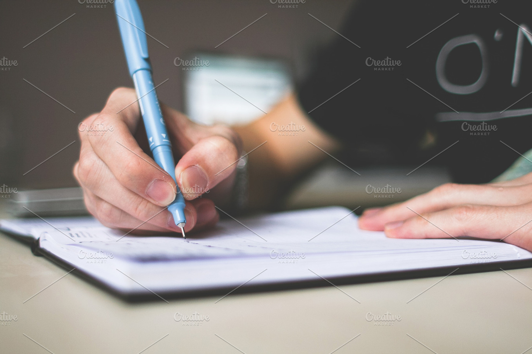 Writing in a diary stock photograph