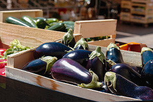 vegetables for sale at an open-air market, a Photo by Nito