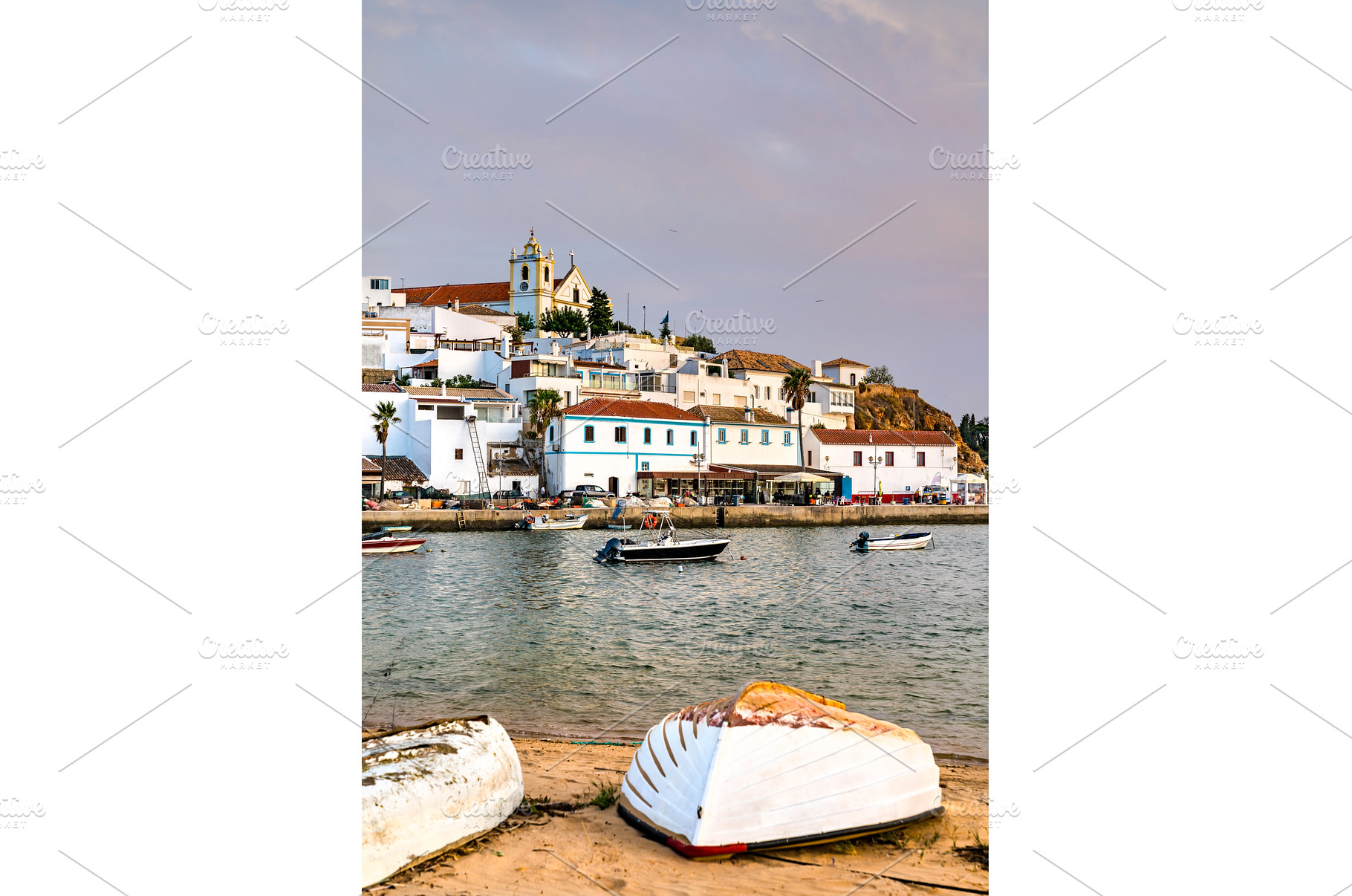 Ferragudo village with fishing boats, an Architecture Photo by Leonid Andronov