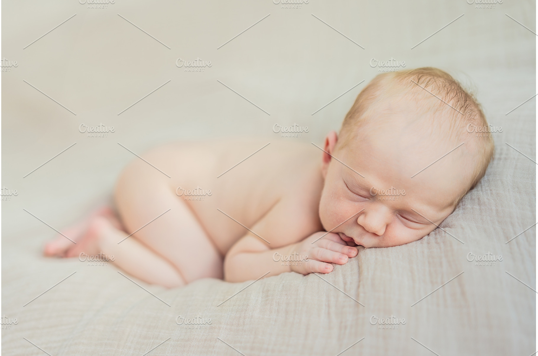 The baby is sleeping peacefully in, a Person Photo by Elizaveta Galitskaya