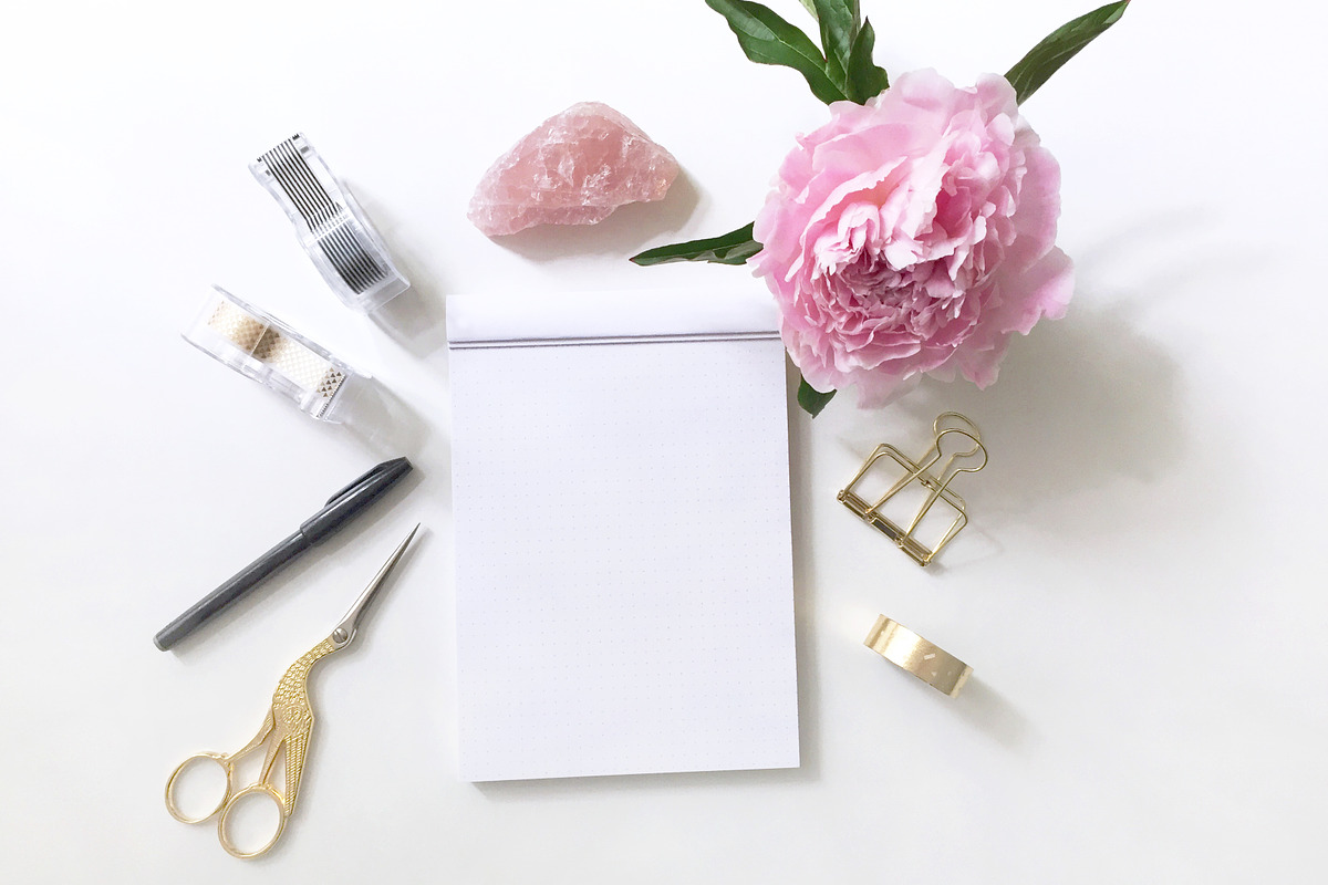 Pink Blossom Flatlay and Writing Pad, a Photo by Yolo Berlin (Photo 1 of 2)