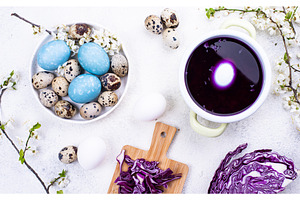 Process of painting Easter eggs in, a Holiday Photo by Yulia Furman