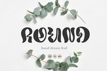 Round Hand Drawn Display liquid Font