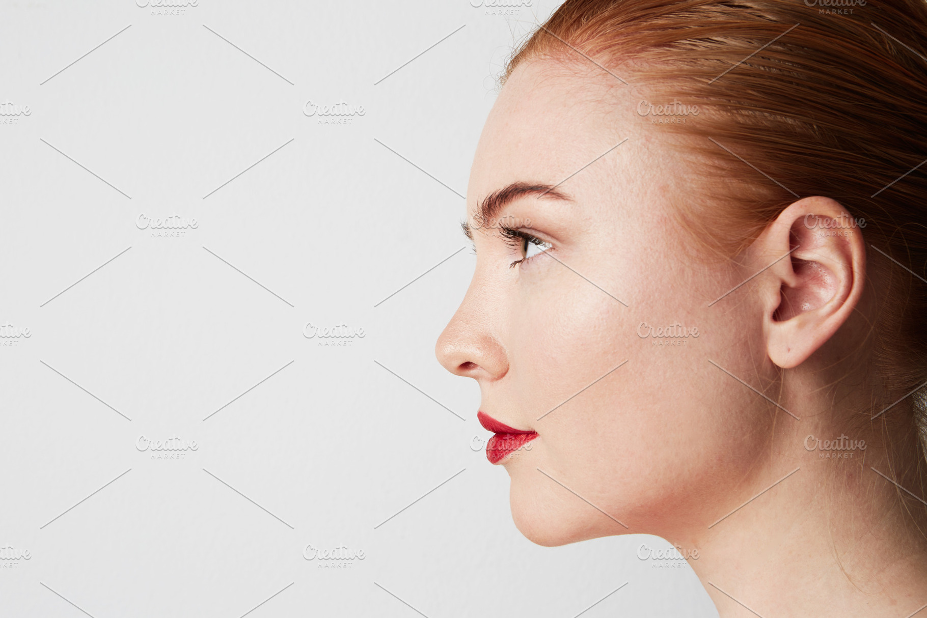 Profile portrait of beauty female featuring beauty, isolated, and attractive, a Person Photo by Klever Level Studio