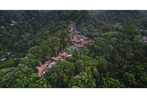 Traditional village hiding in lush, an Architecture Photo by Goinyk
