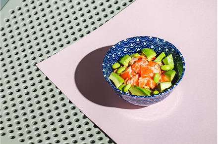 Poke bowl with rice, avocado, a Food & Drink Photo by Irina Burakova