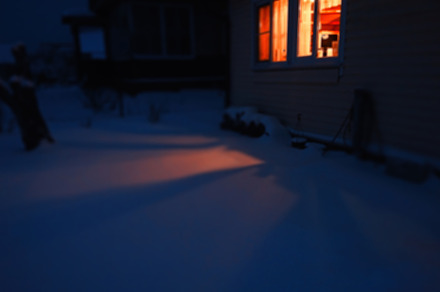 Light from the window of winter house background