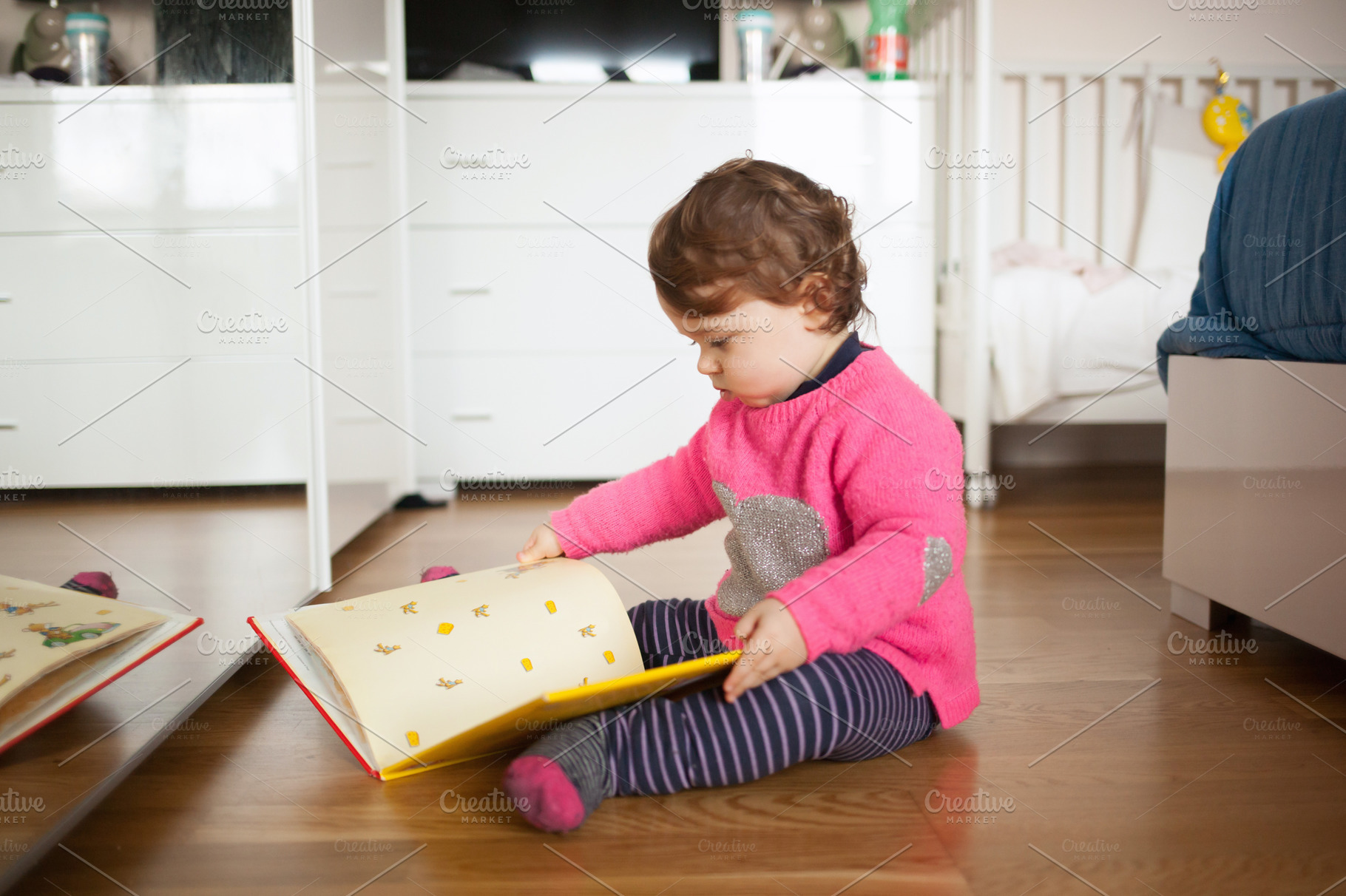 Toddler baby girl playing with fairy, a Person Photo by Antonio Gravante Market