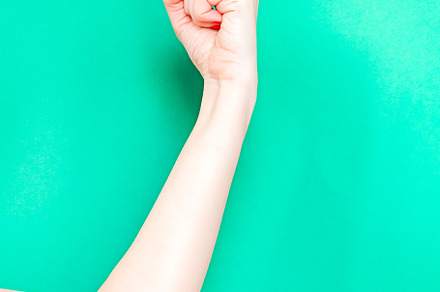 The flexing or strong arm hand sign containing strength, biceps, and flexed