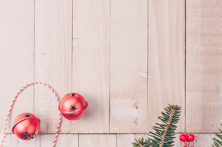 Red holiday bells with Christmas tre, a Background Photo by Kate Molchanova