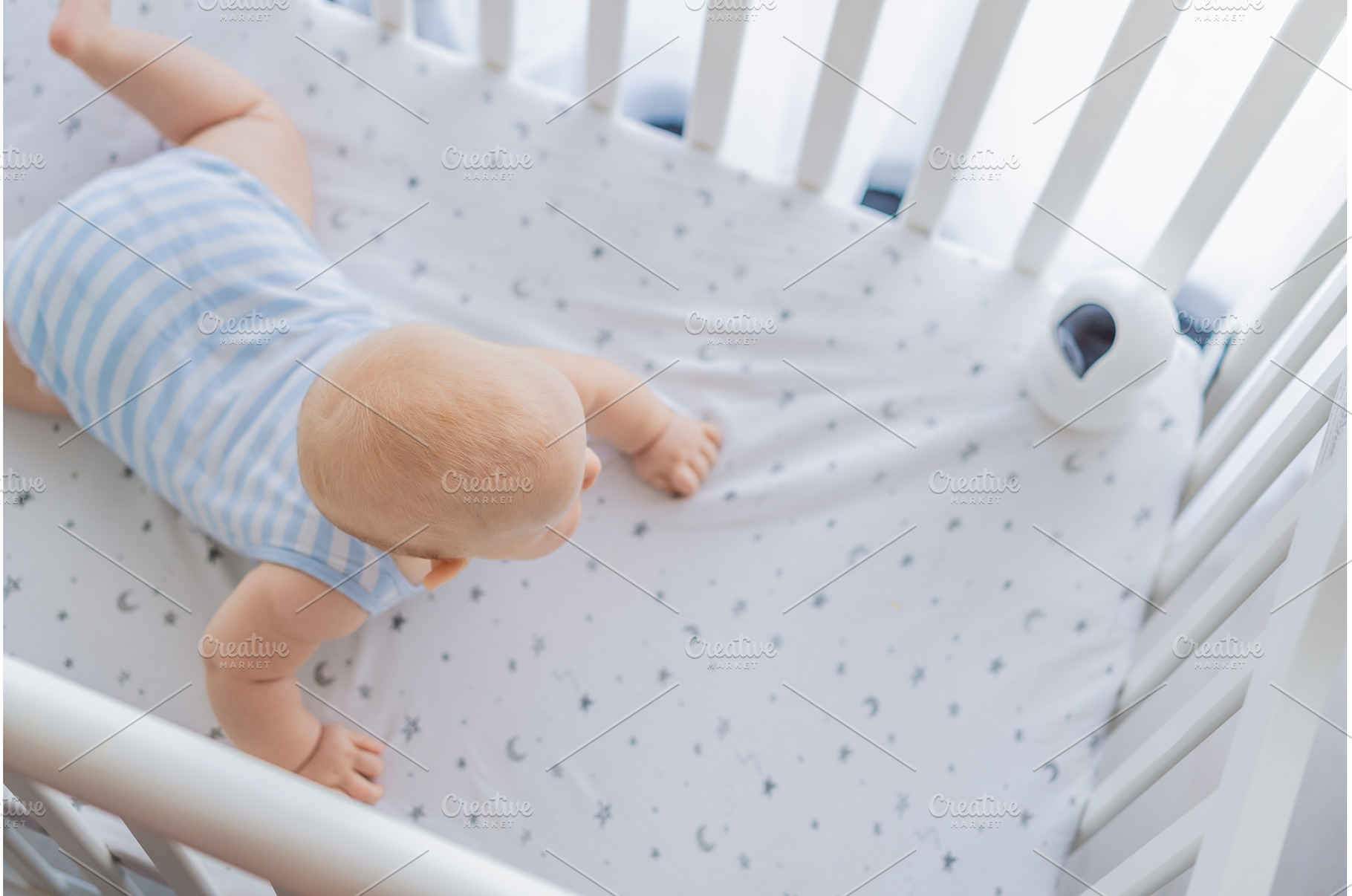 Baby monitor camera placed inside a, a Technology Photo by Elizaveta Galitskaya