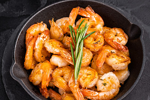 Close up of juicy grilled prawns garnished with herbs, a delicio, a Food & Drink Photo by composter-box@mail.ru