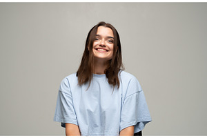 Young woman smiling, expressing, a Person Photo by volodymyrshtun13795