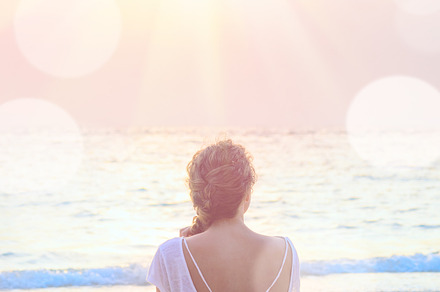 Woman practicing yoga at sunrise beach featuring woman, summer, and beach, a Person Photo by sergeypeterman