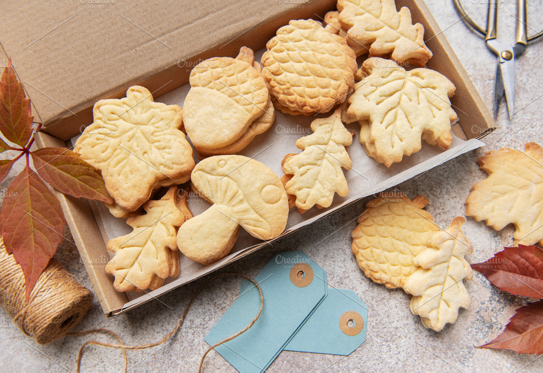 Autumn cookies in gift box with leaves and twine, a Food & Drink Photo by Olena Rudo