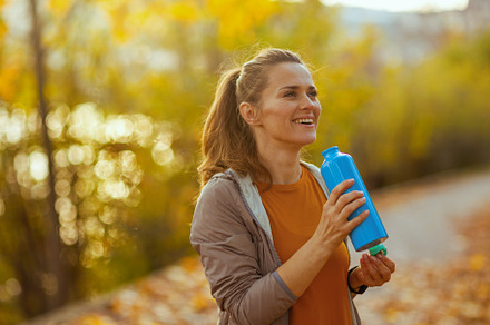 happy trendy woman in fitness clothes in park, a Sports & Recreation Photo by Alliance Images
