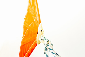 Sailing boat ropes tied to an orange, a Photo by Dvoevnore photos