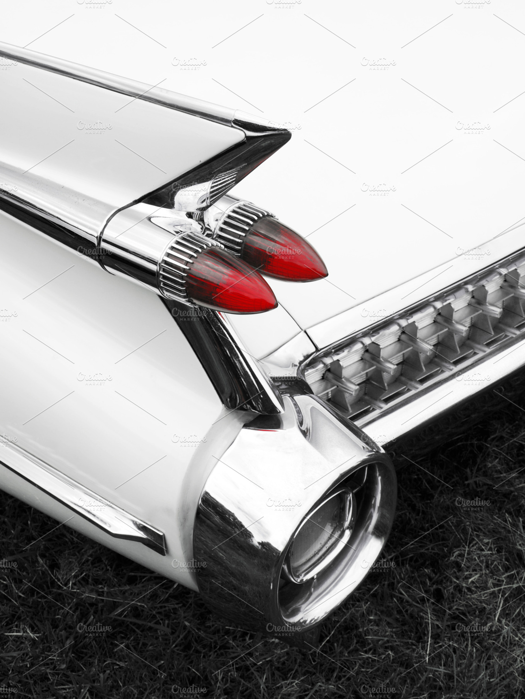Vintage 1950s car tail light containing test, classic car, and tail fin