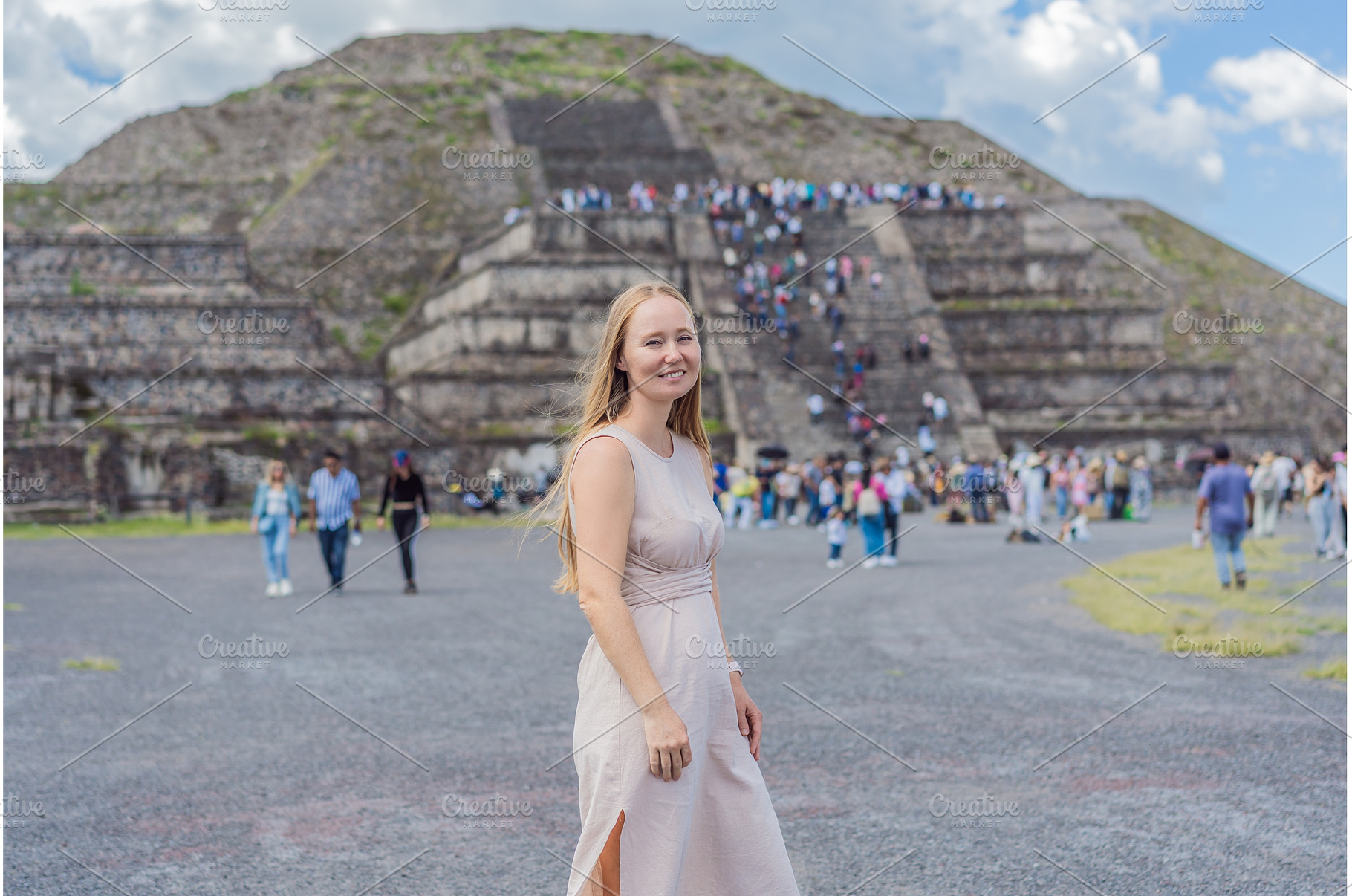 Female tourist standing in front of, a Person Photo by Elizaveta Galitskaya