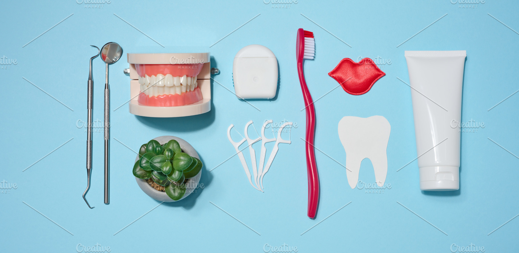 Set of oral hygiene products and tools, tube of toothpaste, toot, a Health & Medical Photo by ndanko