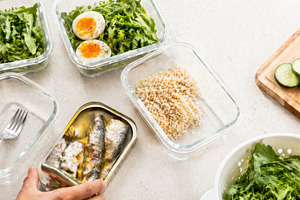 Meal prep with sardines, eggs, green, a Photo by Dvoevnore photos