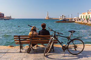 Couple with bicycle overlooking