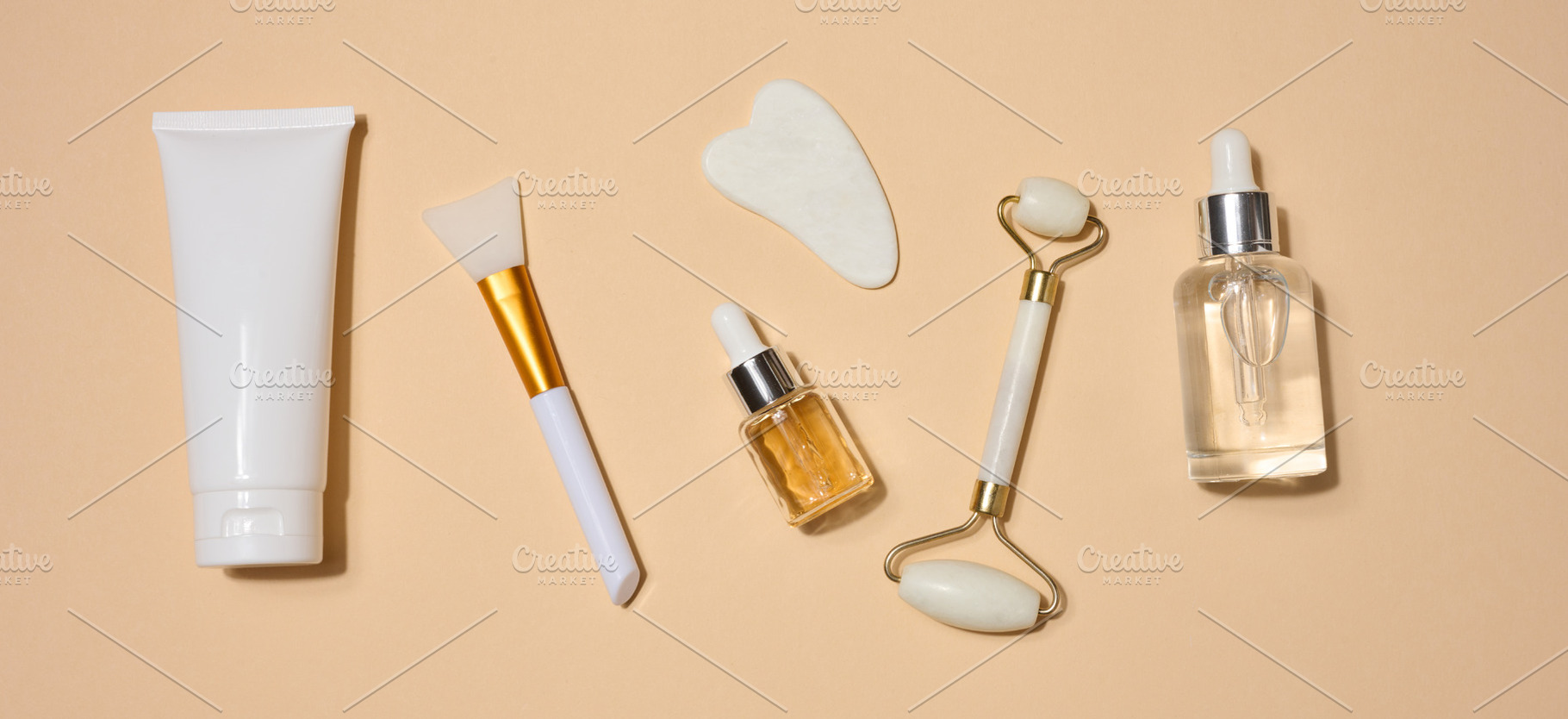Set of cosmetics and skin care tools including tube of cream, fa, a Health & Medical Photo by ndanko