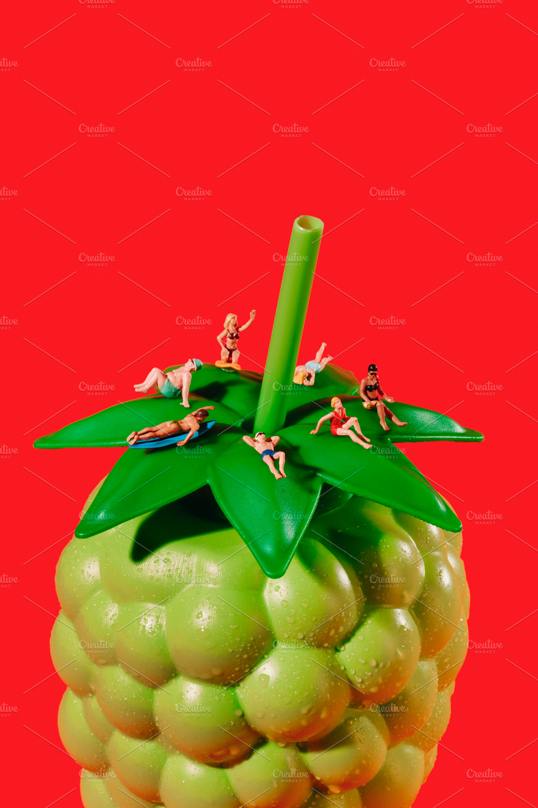 miniature people in swimwear on a green bottle, a Photo by Nito