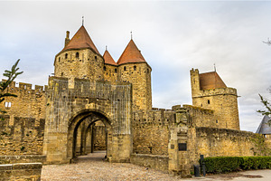 Entrance to the cite de carcassonne a medieval citadel in franc featuring, an Architecture Photo by Leonid Andronov