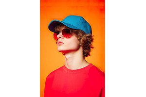Young Gen Z male wearing blue cap, a Person Photo by Lermont51