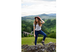 Young tourist woman traveller with, a Person Photo by HalfPoint