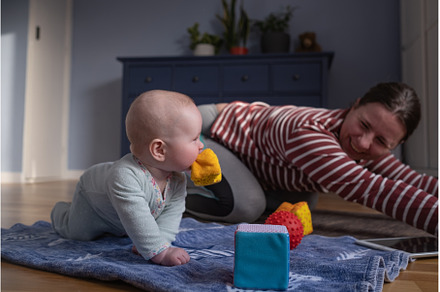 Mother with baby make yoga at home, a Sports & Recreation Photo by Koldunova