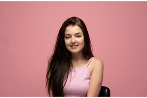 Young woman smiling, expressing, a Person Photo by volodymyrshtun13795