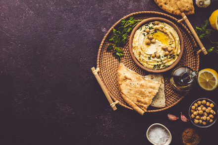 Large bowl of homemade hummus garnis stock photo containing above and, a Food & Drink Photo by Natalia Klenova's Shop