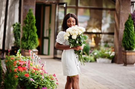 Beautiful african american girl hold featuring women, bouquet, and roses, a Beauty & Fashion Photo by AS photostudio