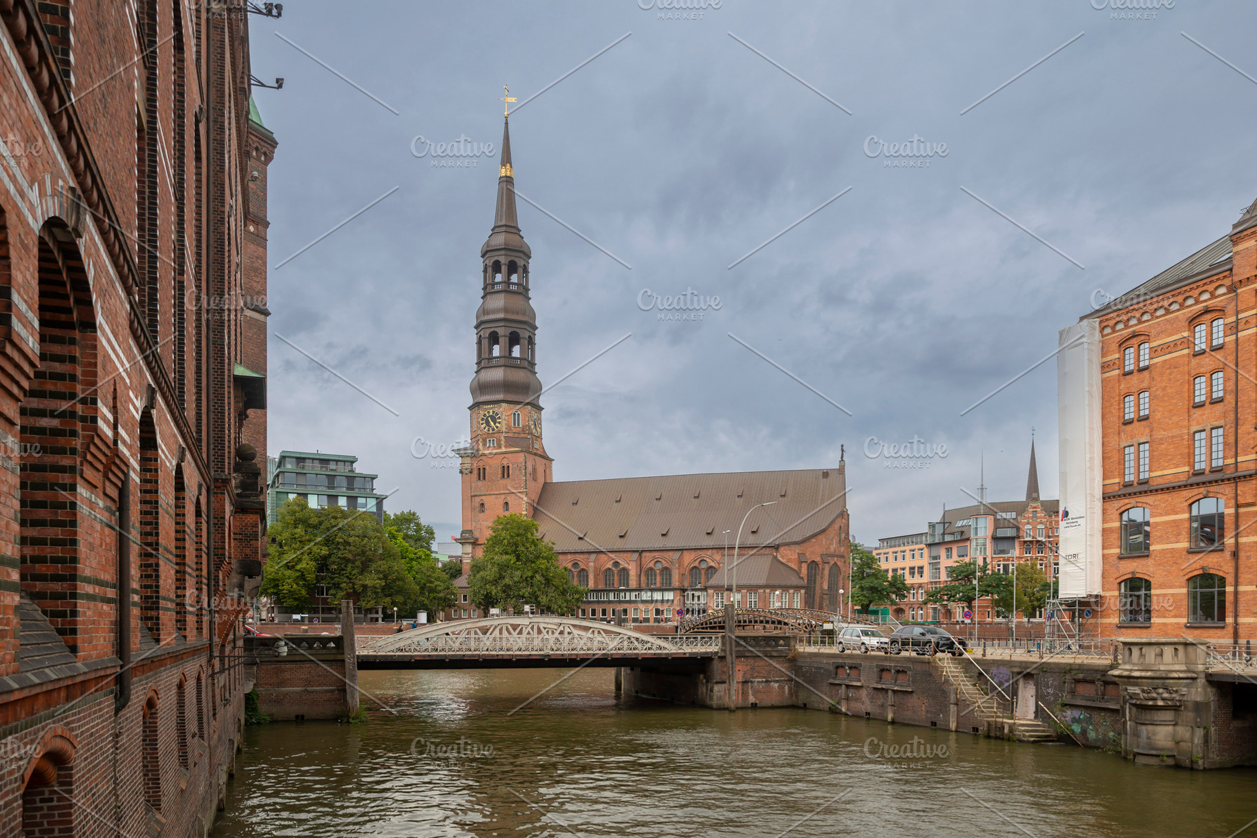 Hamburg, Germany, September 13, 2026 — View along a canal towa, an Architecture Photo by Imaginarium