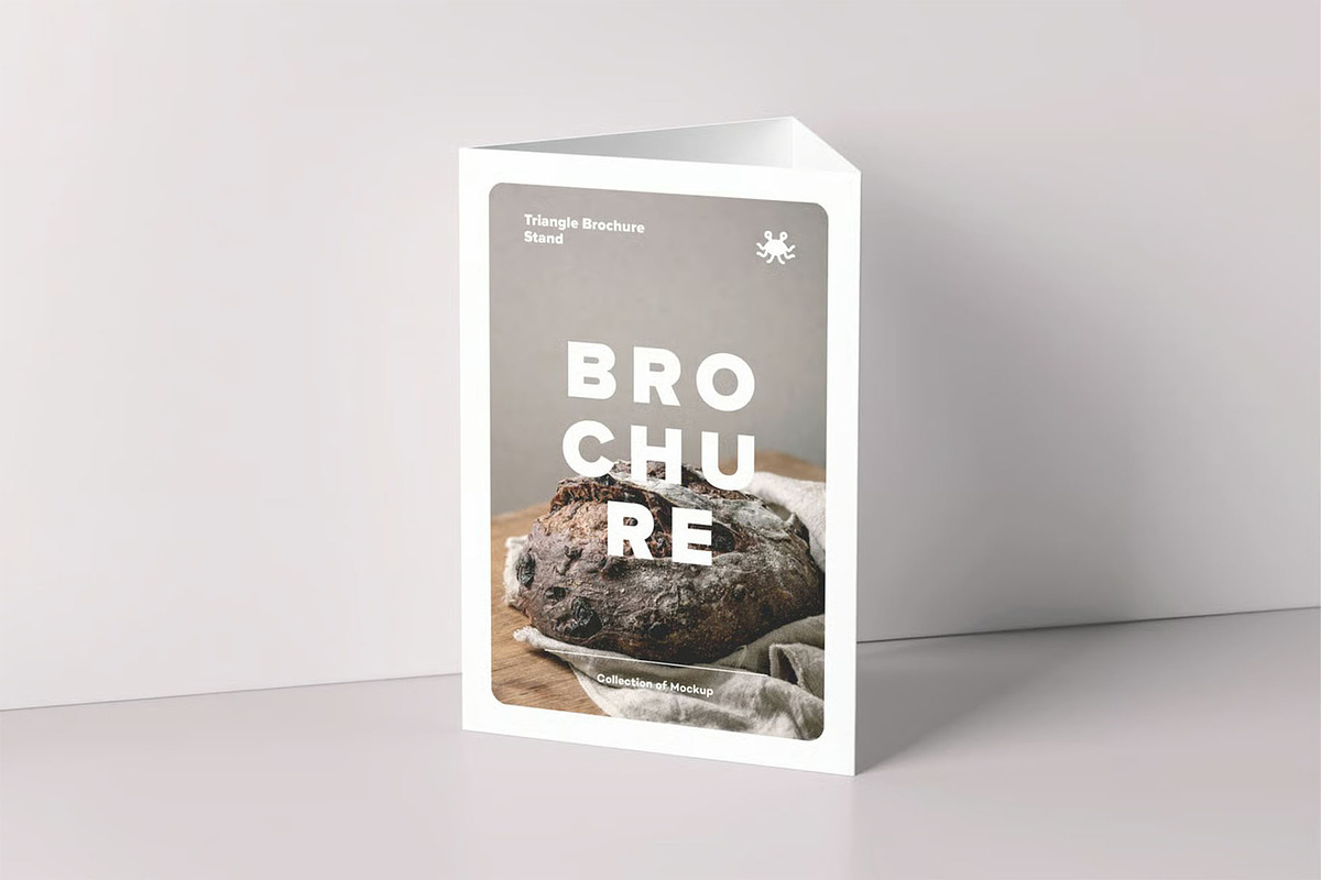 Triangle A5 Brochure Stand Mock-up, an Advertising Mockup by zippypixelstudio (Photo 9 of 10)