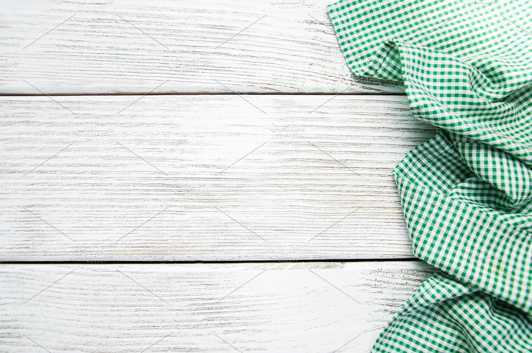 Green napkin containing wooden, background, and table, an Abstract Photo by Olena Rudo