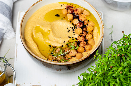 Traditional homemade chickpea hummus, a Food & Drink Photo by Marina_Pronina