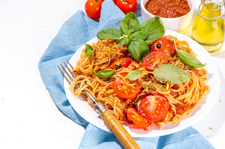 Spaghetti pasta with grilled tomatoes, a Food & Drink Photo by Rimma