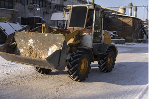 Front loader moving material at, an Industrial Photo by volodymyrshtun13795
