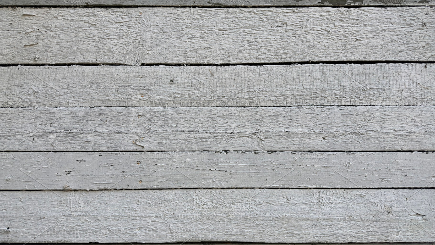 A close-up view of a weathered white wooden plank wall, showcasing the texture, a Nature Photo by Textures & Backgrounds